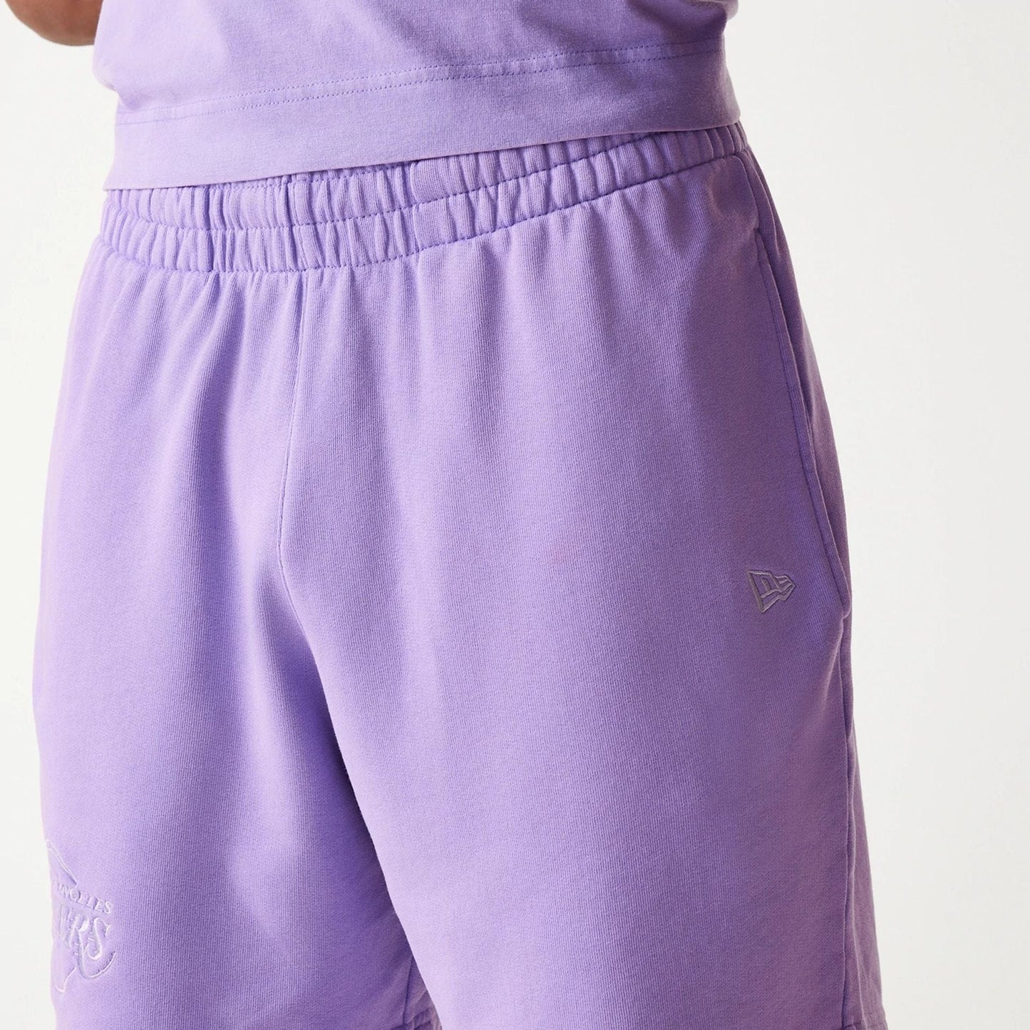 The Male model is wearing LA Lakers NBA Washed Purple Shorts 6