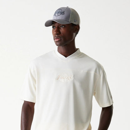 The Male model is wearing LA Lakers NBA Tonal Open White Mesh Jersey 3