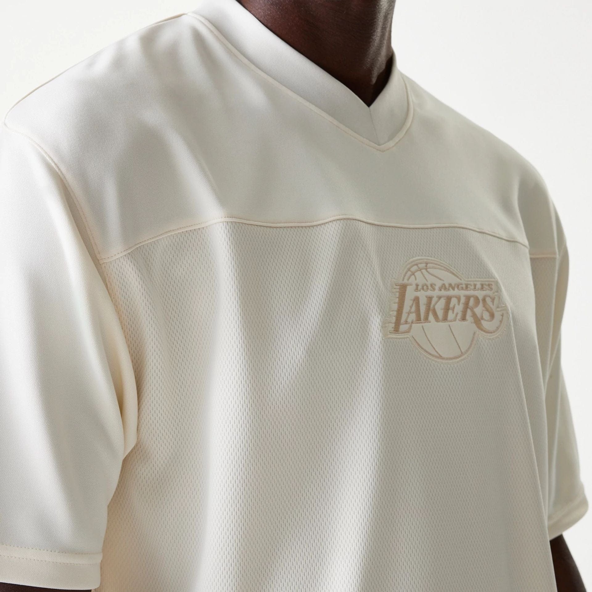 The Male model is wearing LA Lakers NBA Tonal Open White Mesh Jersey 4