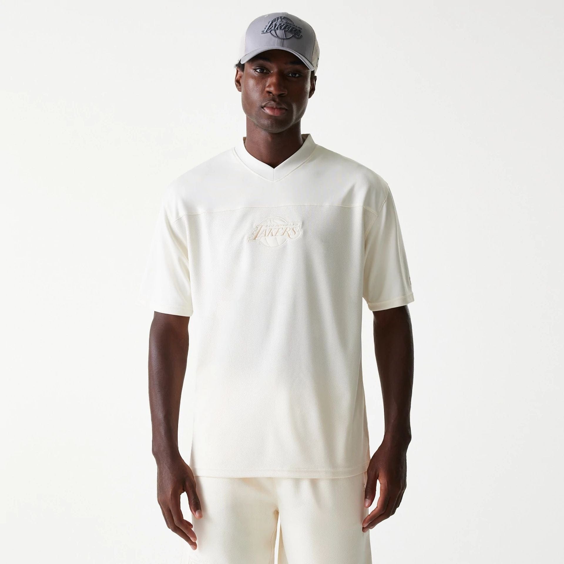 The Male model is wearing LA Lakers NBA Tonal Open White Mesh Jersey 1