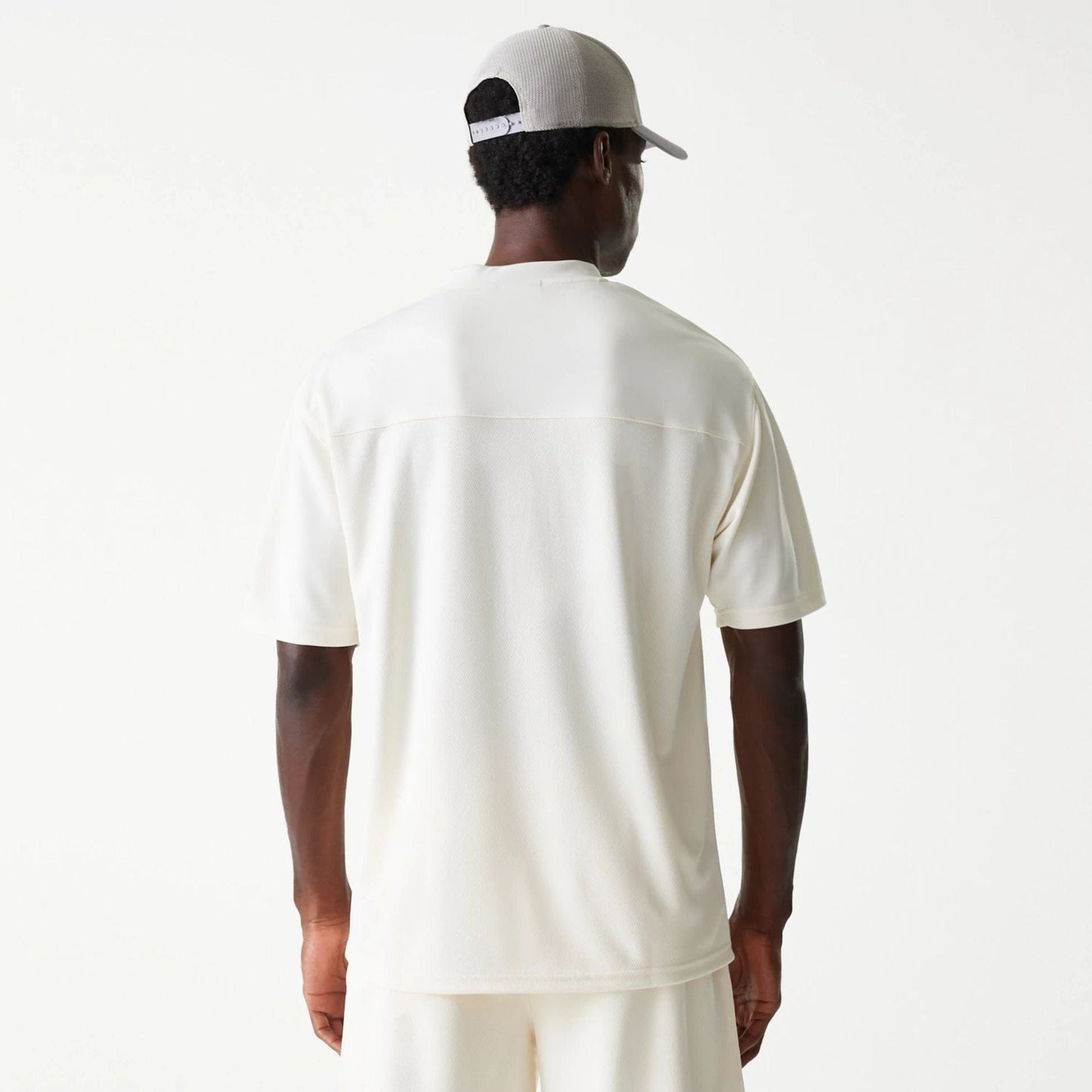 The Male model is wearing LA Lakers NBA Tonal Open White Mesh Jersey 2