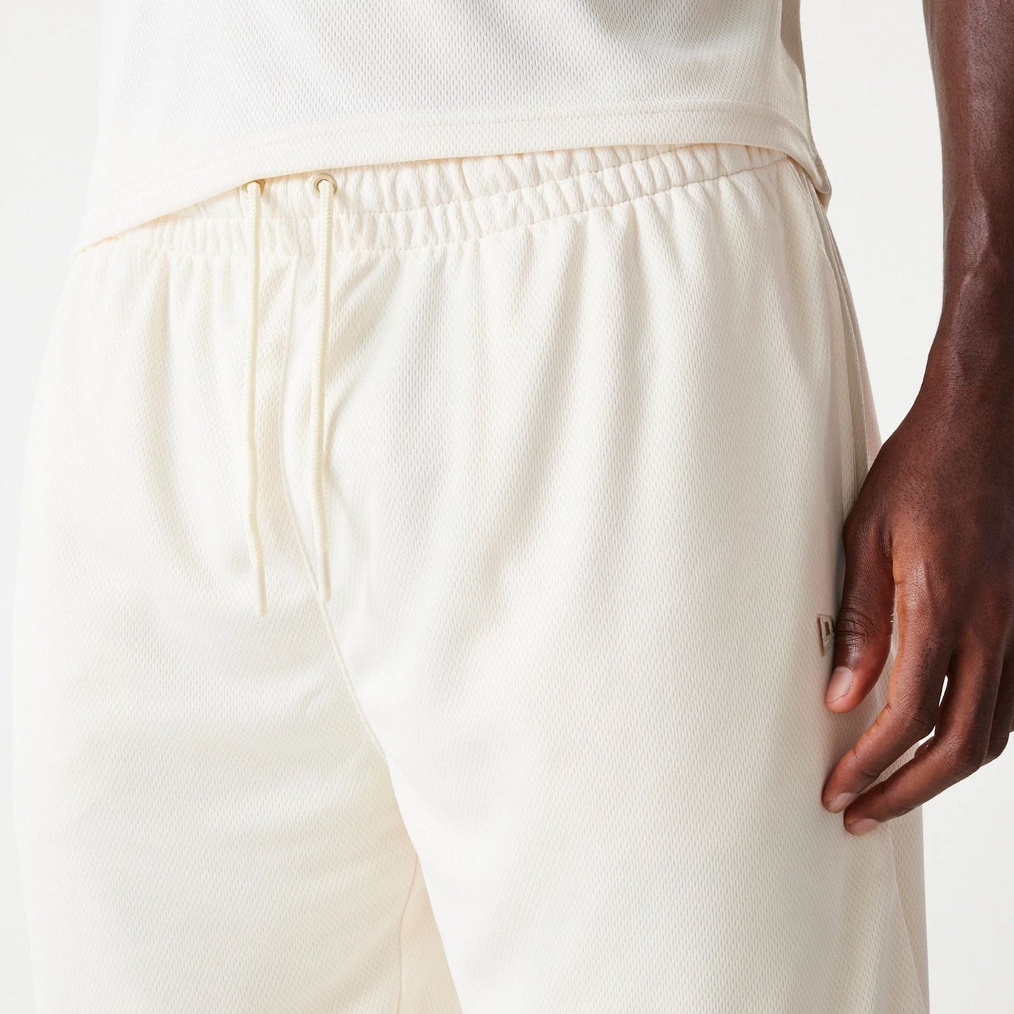 The Male model is wearing LA Lakers NBA Tonal Open White Mesh Shorts 5