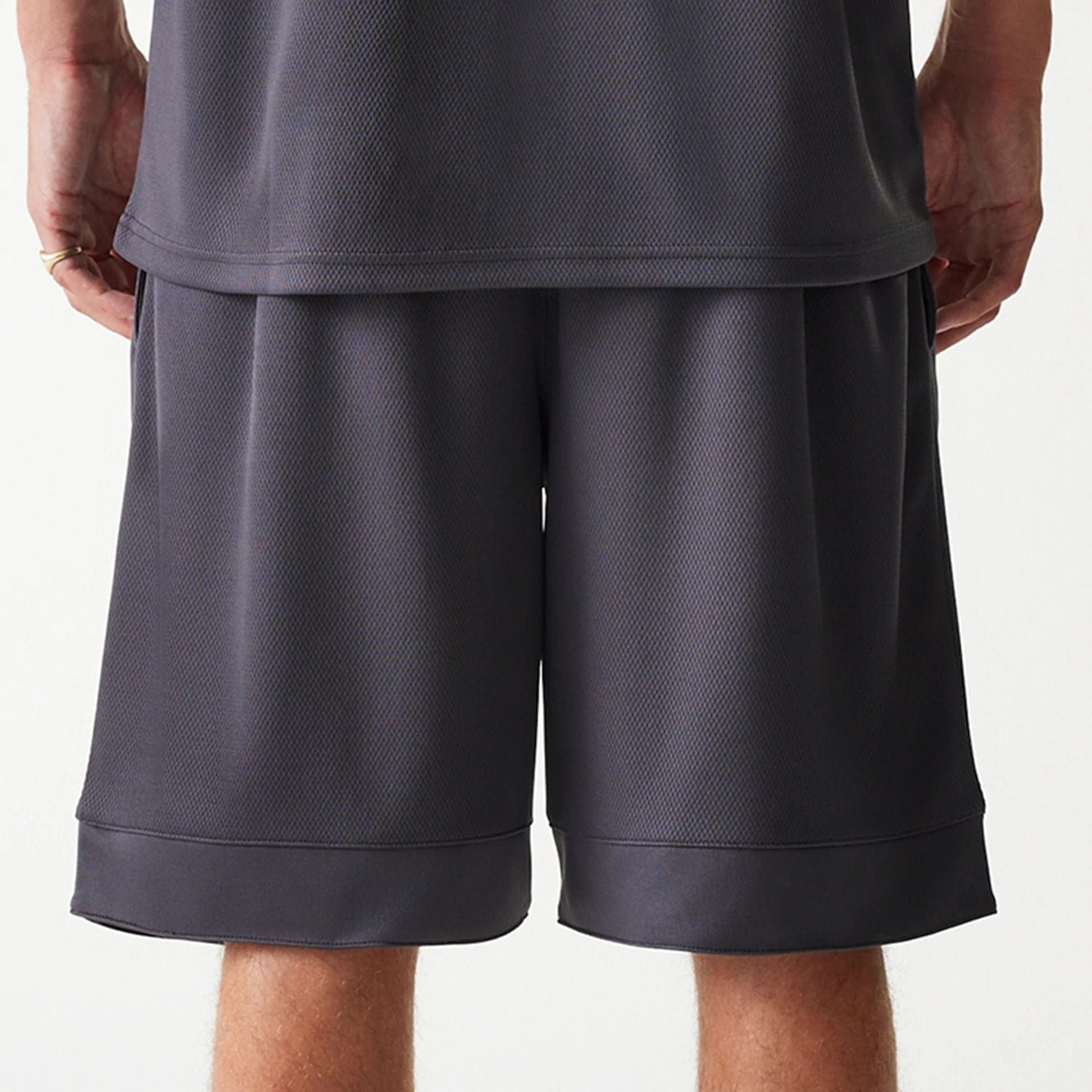 The Male model is wearing Chicago Bulls NBA Tonal Dark Grey Mesh Shorts 7