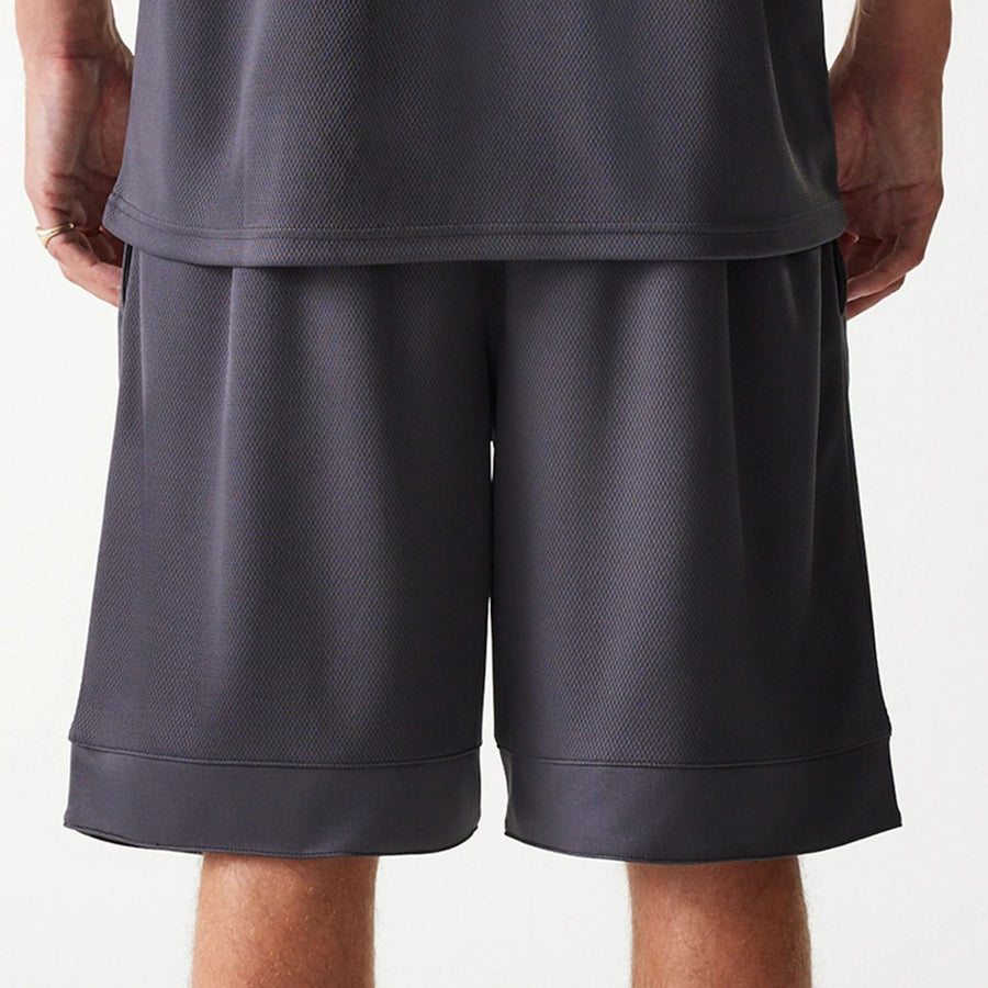 The Male model is wearing Chicago Bulls NBA Tonal Dark Grey Mesh Shorts 7