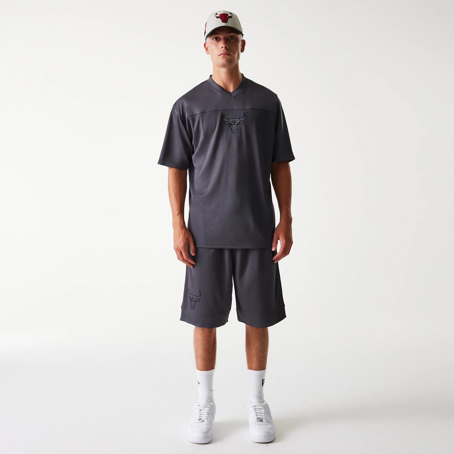 The Male model is wearing Chicago Bulls NBA Tonal Dark Grey Mesh Shorts 8
