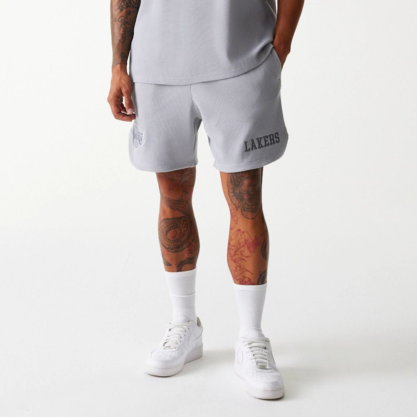 The Male model is wearing LA Lakers NBA Waffle Grey Shorts 7