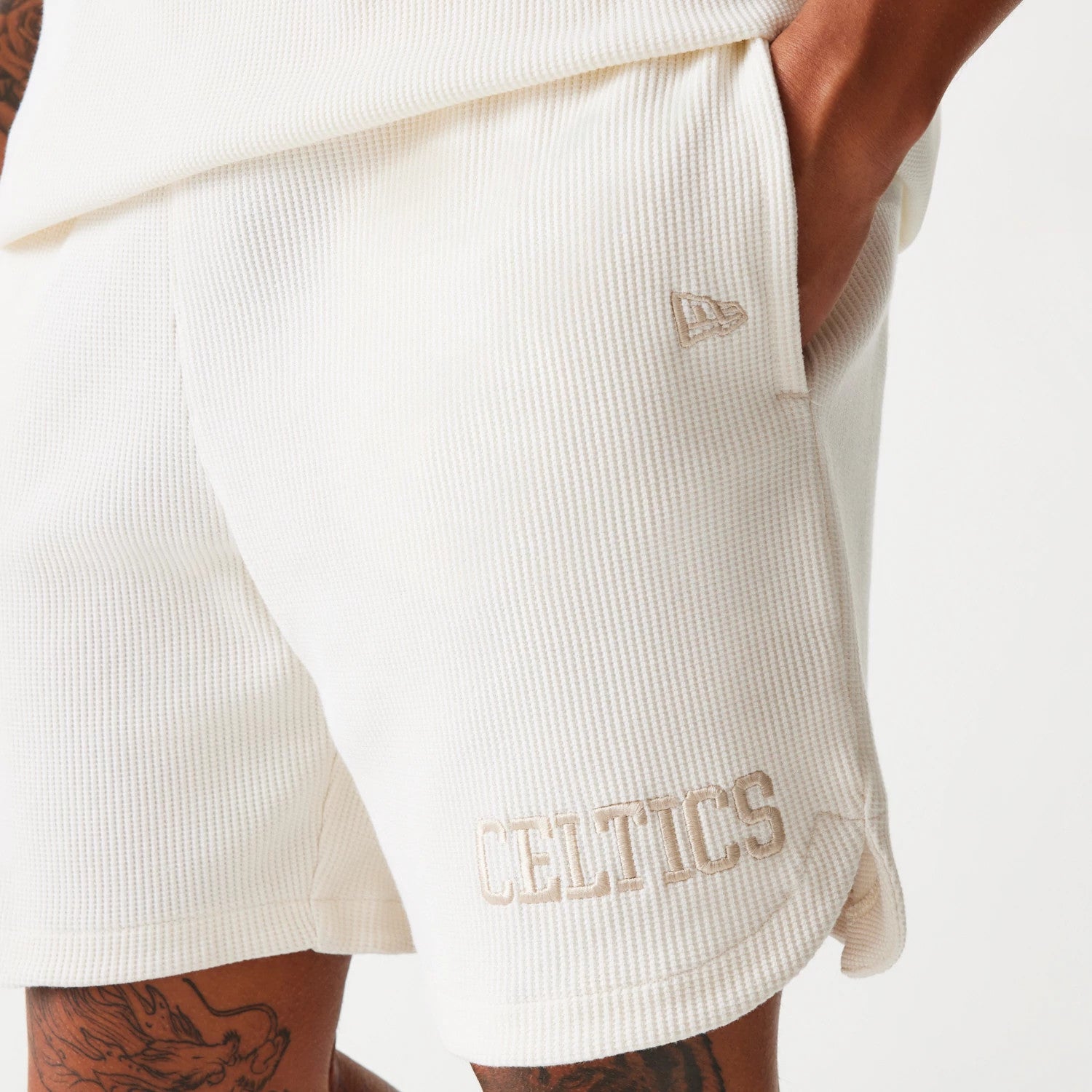 The Male model is wearing Boston Celtics NBA Waffle Open White Shorts 4