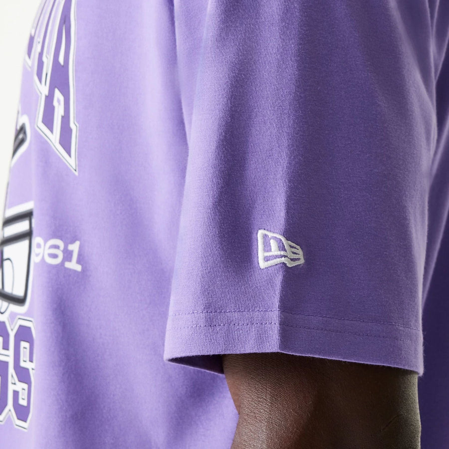 The Male model is wearing Minnesota Vikings NFL Helmet Purple Oversized T-Shirt 5