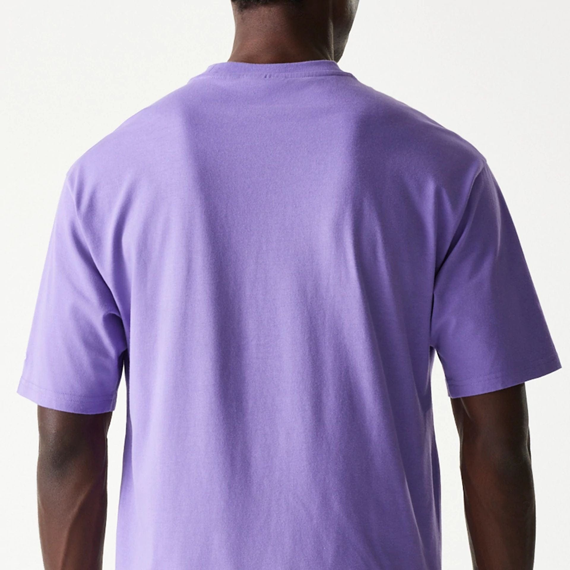 The Male model is wearing Minnesota Vikings NFL Helmet Purple Oversized T-Shirt 7