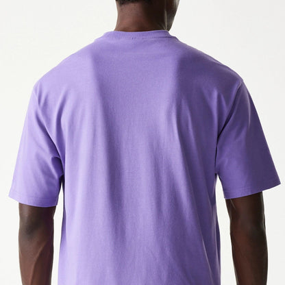 The Male model is wearing Minnesota Vikings NFL Helmet Purple Oversized T-Shirt 7