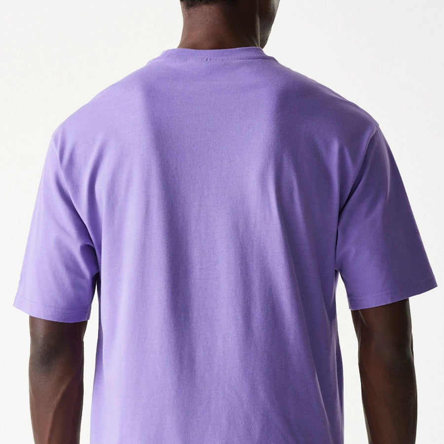 The Male model is wearing Minnesota Vikings NFL Helmet Purple Oversized T-Shirt 7