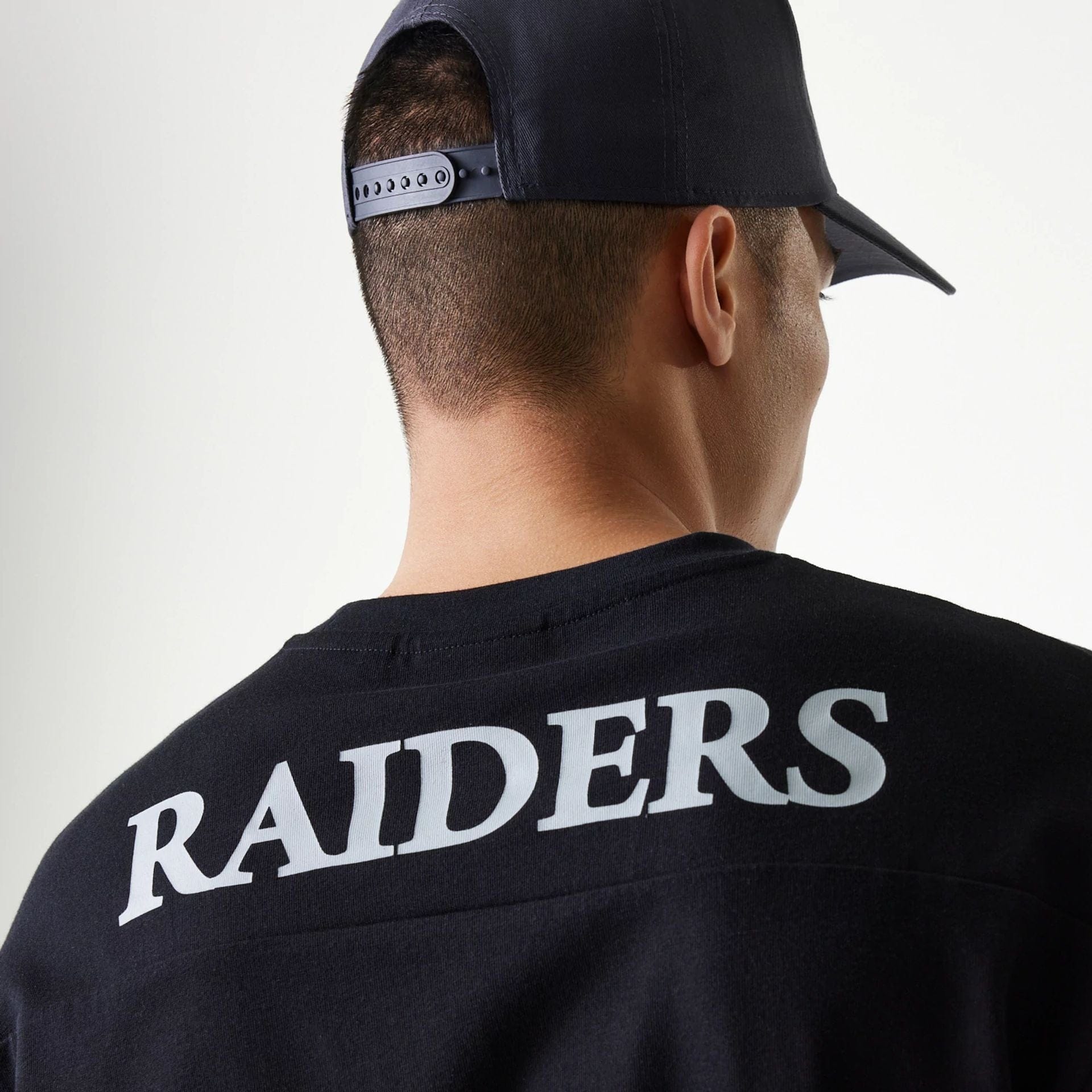 The Male model is wearing Las Vegas Raiders NFL Graphic Black Long Sleeve T-Shirt 4