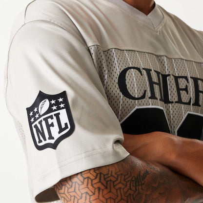 The Male model is wearing Kansas City Chiefs NFL Pinstripe Cream Mesh Jersey 5