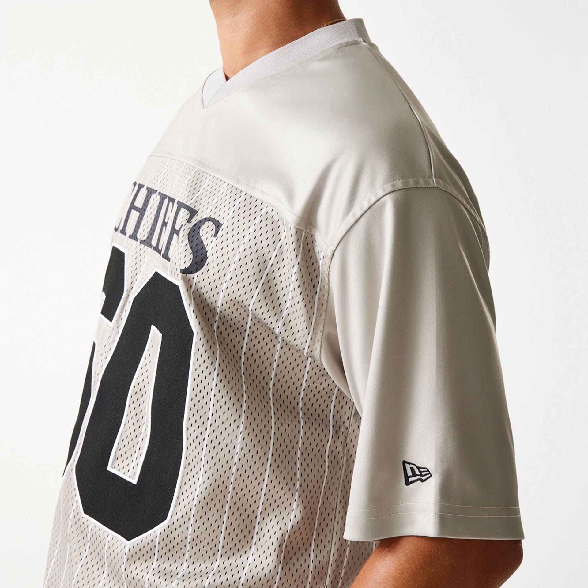 The Male model is wearing Kansas City Chiefs NFL Pinstripe Cream Mesh Jersey 6