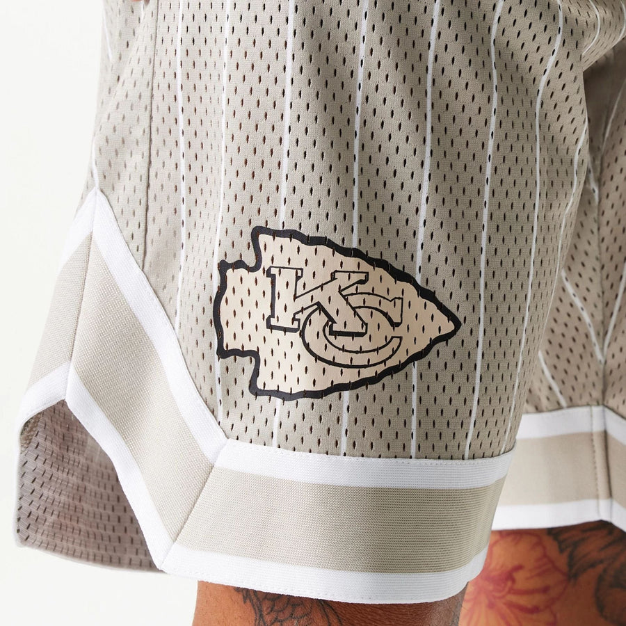 The Male model is wearing Kansas City Chiefs NFL Pinstripe Cream Shorts 4
