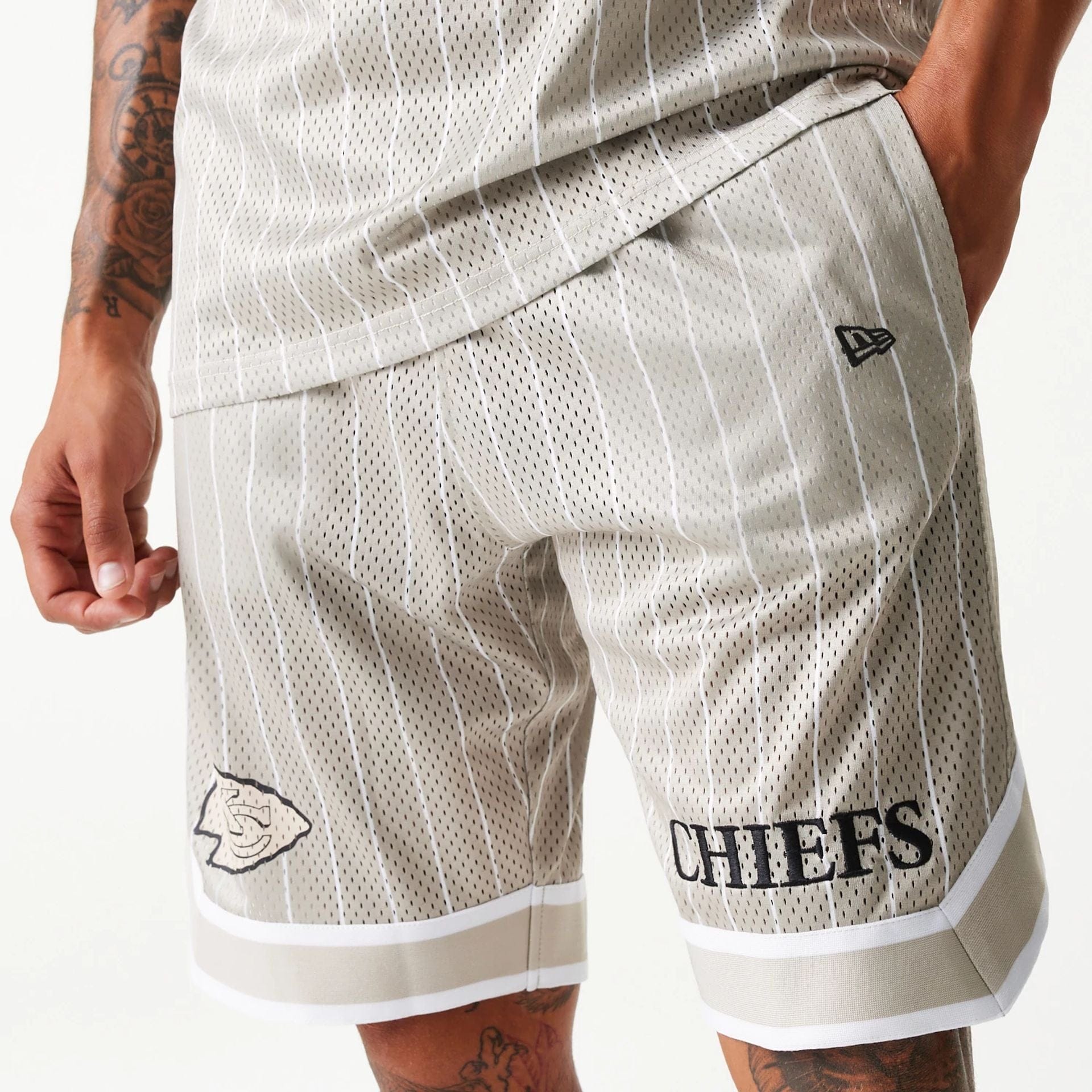 The Male model is wearing Kansas City Chiefs NFL Pinstripe Cream Shorts 5