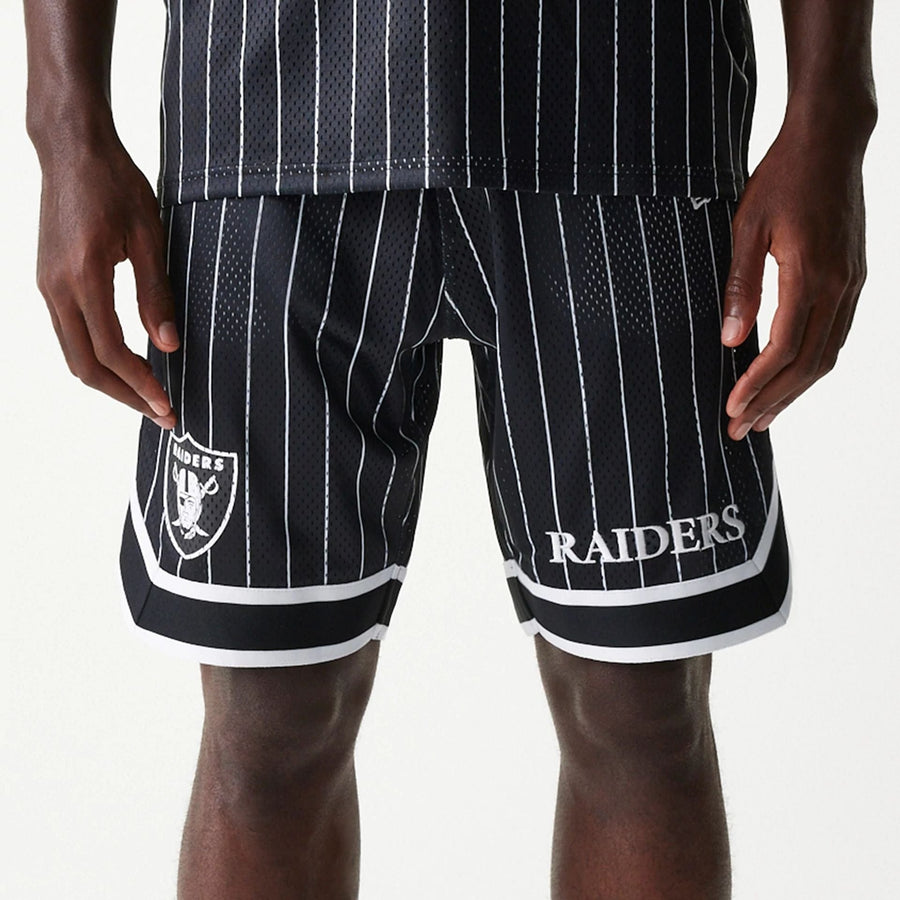 The Male model is wearing Las Vegas Raiders NFL Pinstripe Black Shorts 1