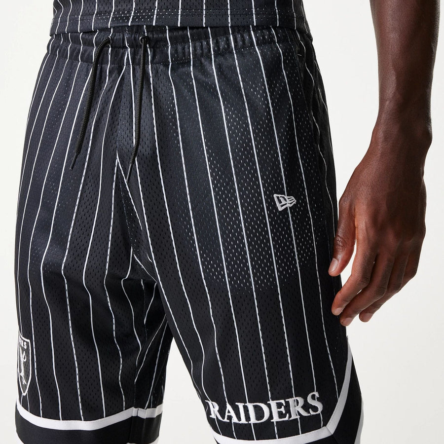 The Male model is wearing Las Vegas Raiders NFL Pinstripe Black Shorts 7