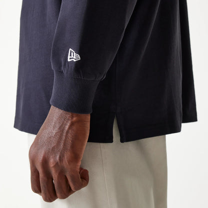The Male model is wearing New Era Navy Oversized Rugby Shirt 5