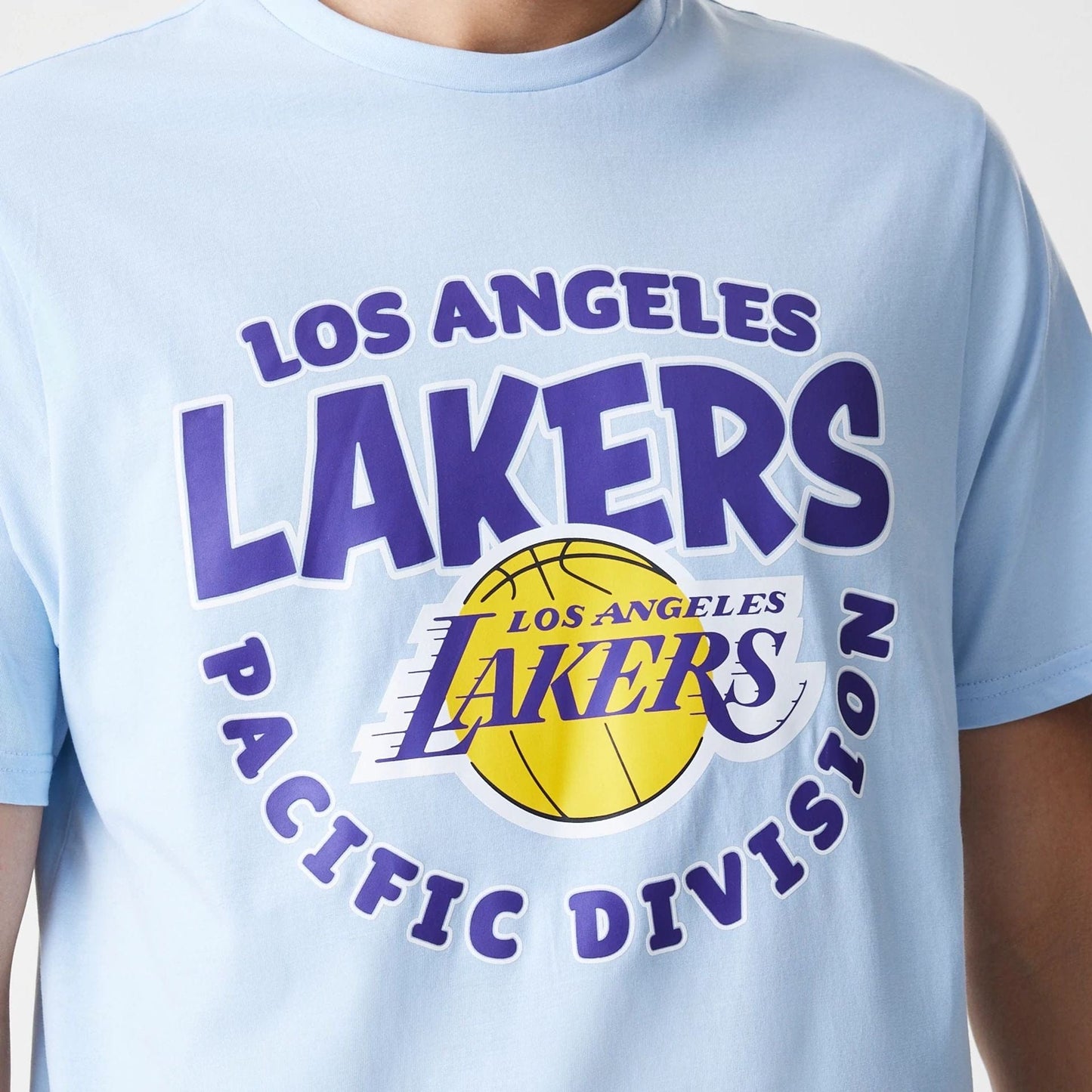 The Male model is wearing LA Lakers NBA Bubble Wordmark Pastel Blue T-Shirt 4