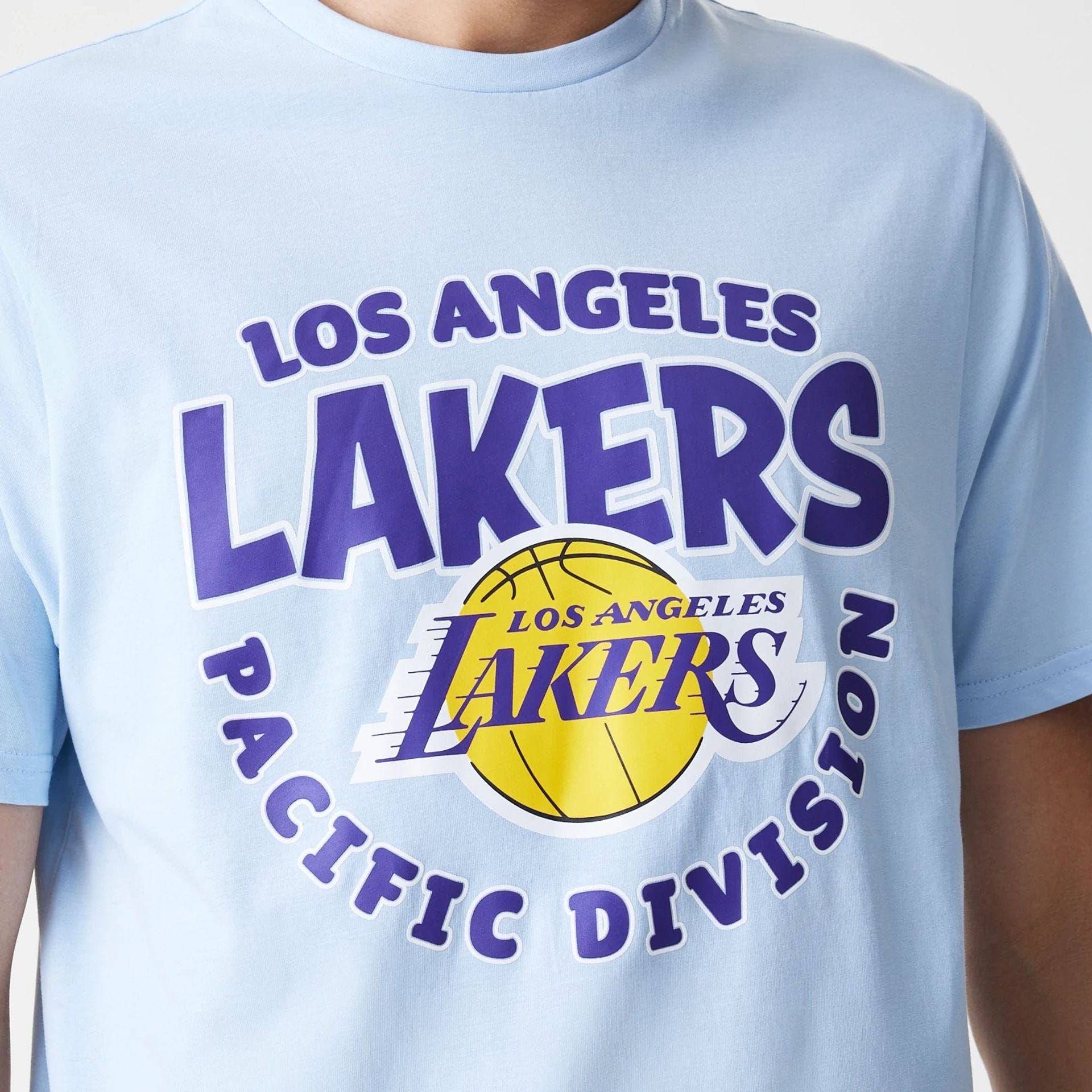 The Male model is wearing LA Lakers NBA Bubble Wordmark Pastel Blue T-Shirt 4