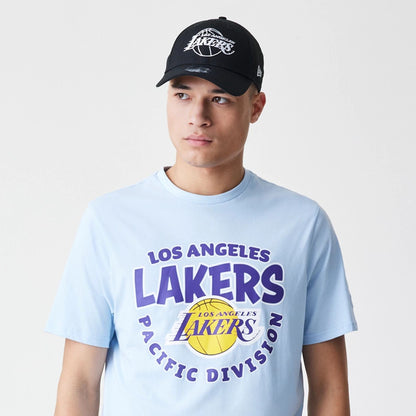 The Male model is wearing LA Lakers NBA Bubble Wordmark Pastel Blue T-Shirt 6