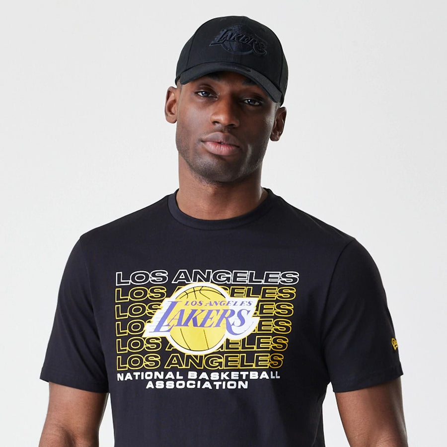 The Male model is wearing LA Lakers NBA Stack Wordmark Black T-Shirt 6