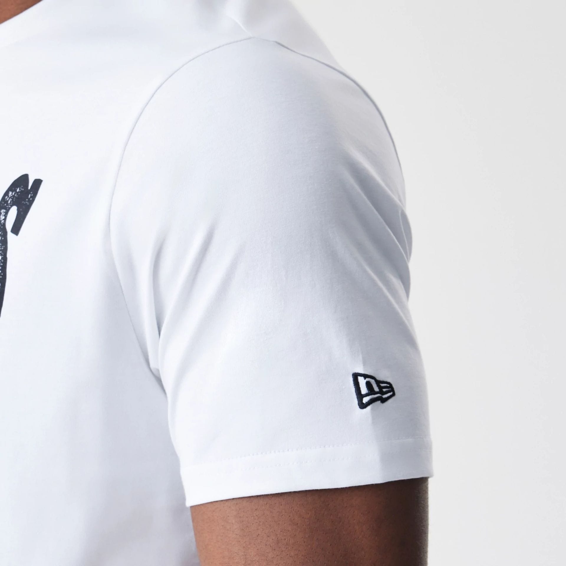 The Male model is wearing Las Vegas Raiders NFL Stack Arch Logo White T-Shirt 5