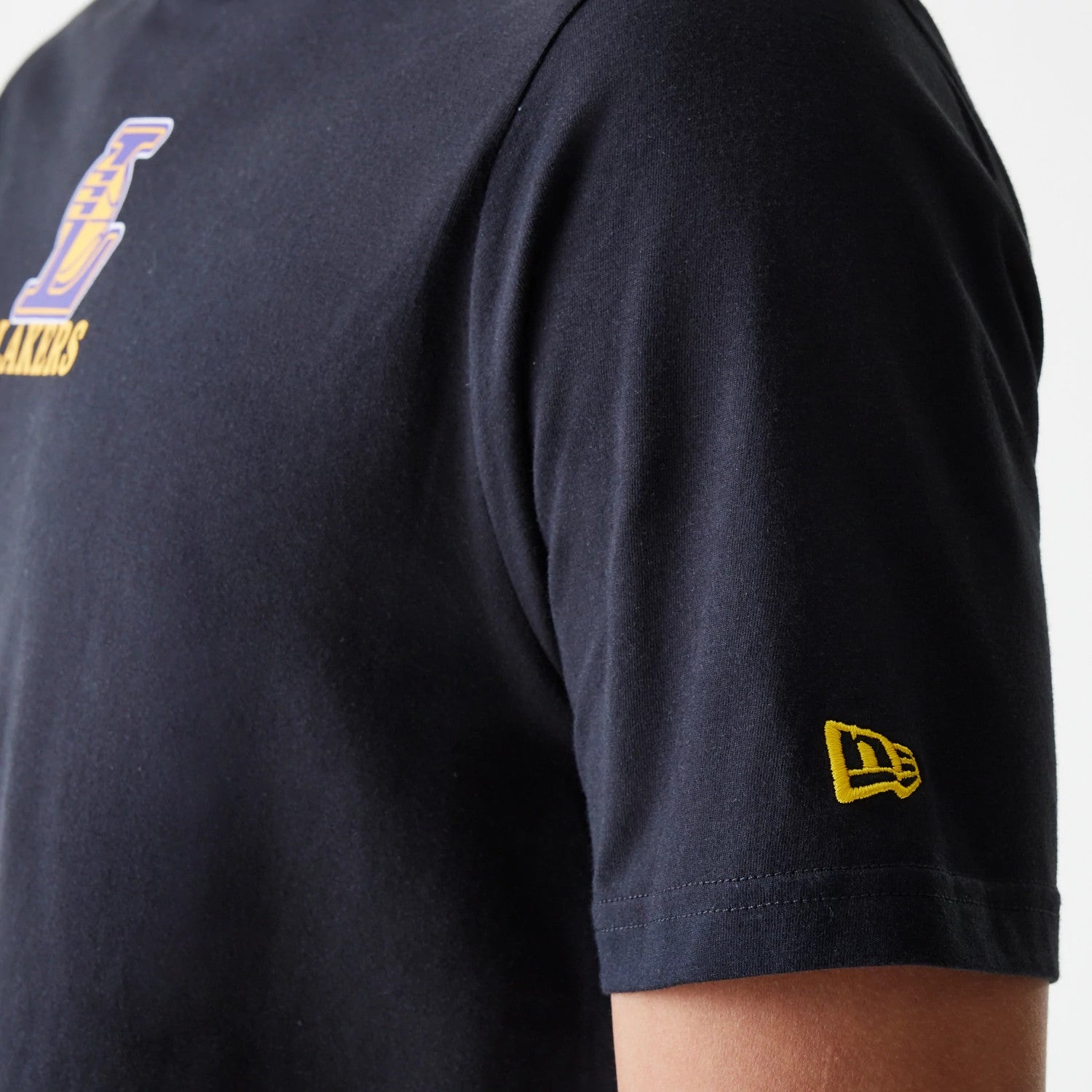 The Male model is wearing LA Lakers NBA Logo Black T-Shirt 6