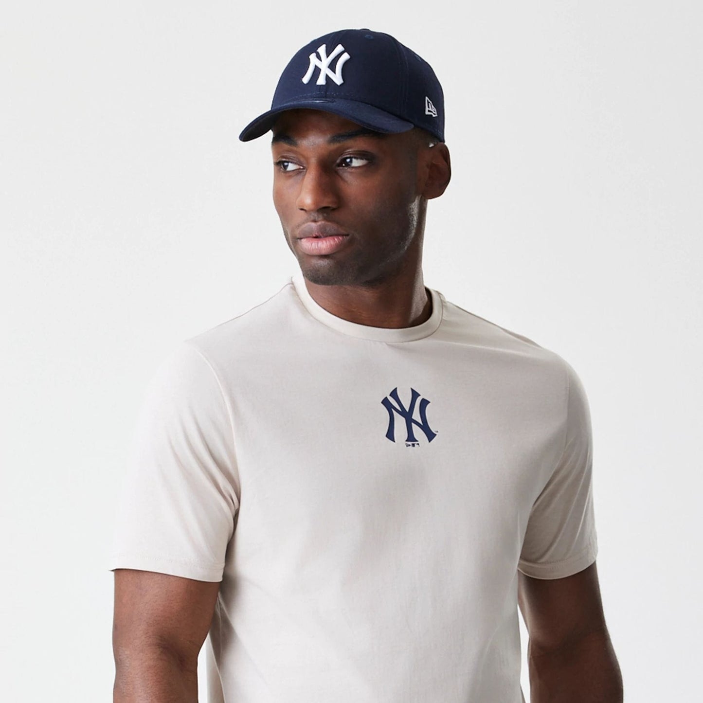 The Male model is wearing New York Yankees MLB Logo Cream T-Shirt 6