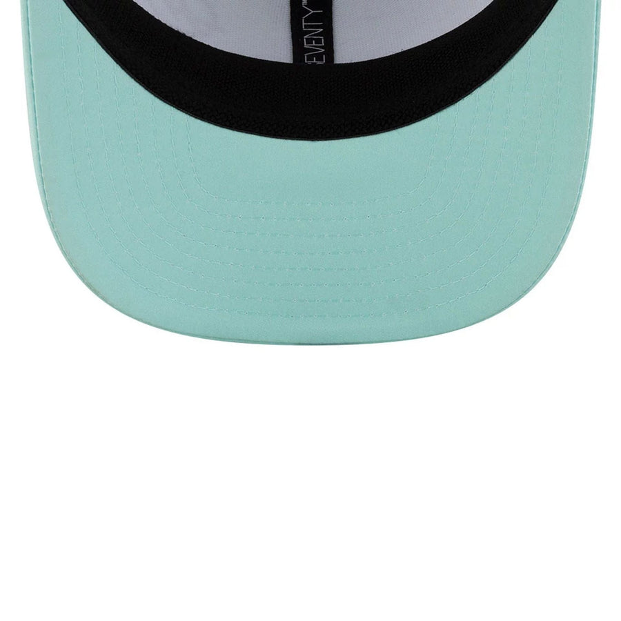 This is a MoneyGram Haas F1 Miami Race Special Turquoise 9SEVENTY Stretch Snap Adjustable Cap 7