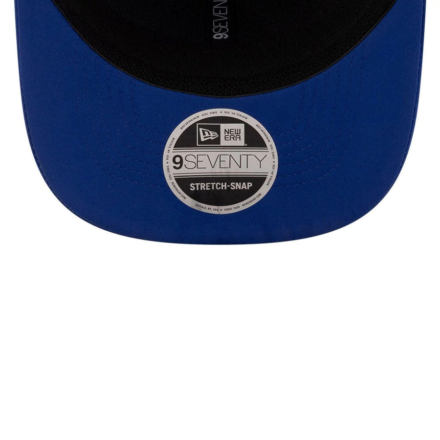 This is a MoneyGram Haas F1 Silverstone Race Special Blue 9SEVENTY Stretch Snap Adjustable Cap 7