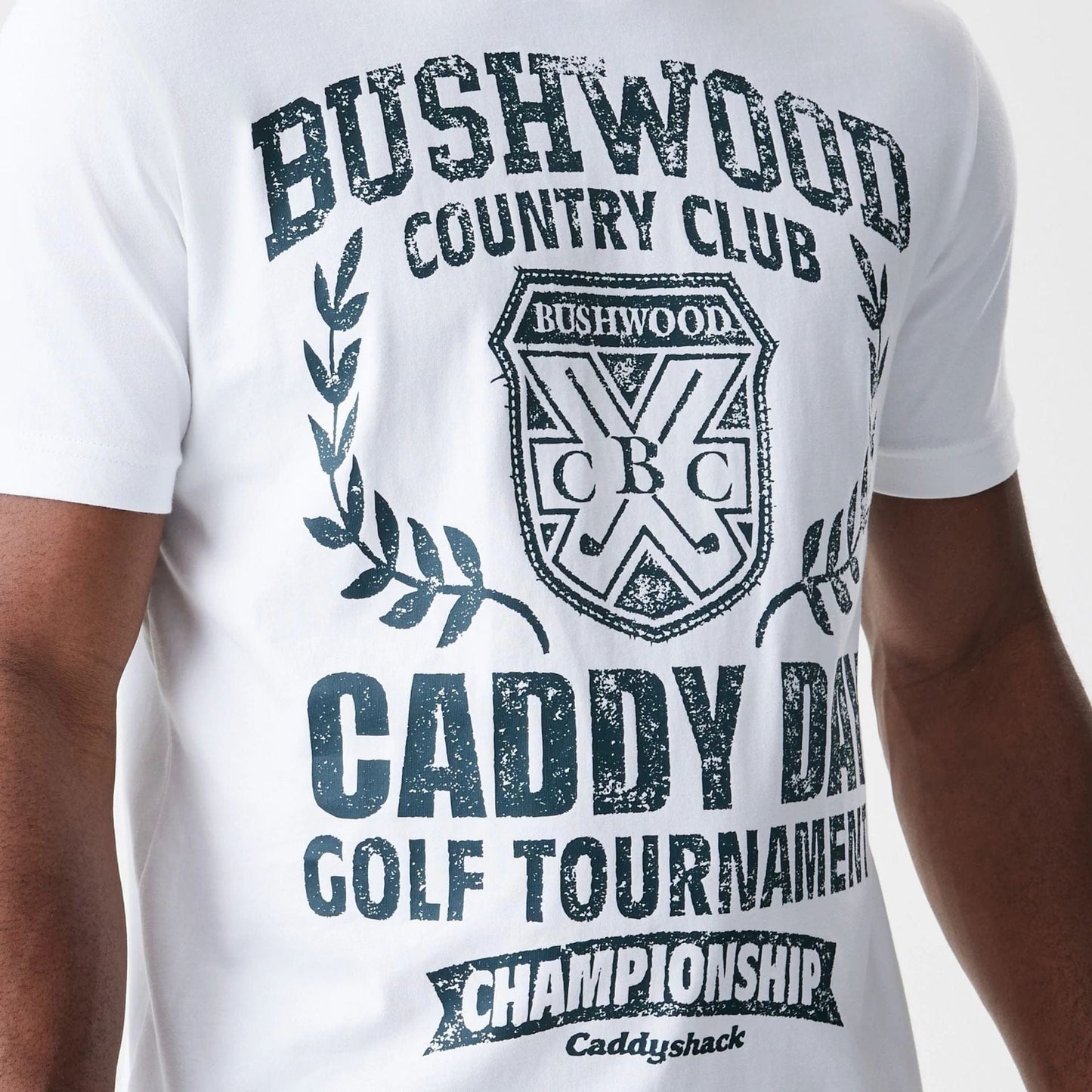 The Male model is wearing Caddyshack Caddy Day Tournament White T-Shirt 4