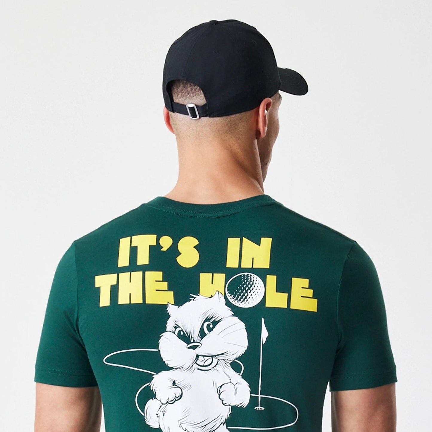 The Male model is wearing Caddyshack It's In The Hole Dark Green T-Shirt 7