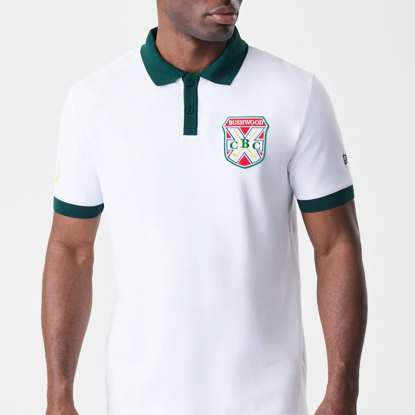 The Male model is wearing Caddyshack BushWood White Polo T-Shirt 3