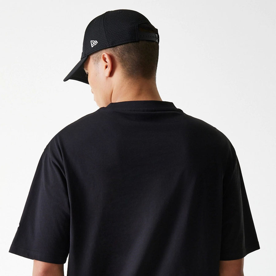 The Male model is wearing New York Yankees MLB League Essential Black Oversized T-Shirt 7