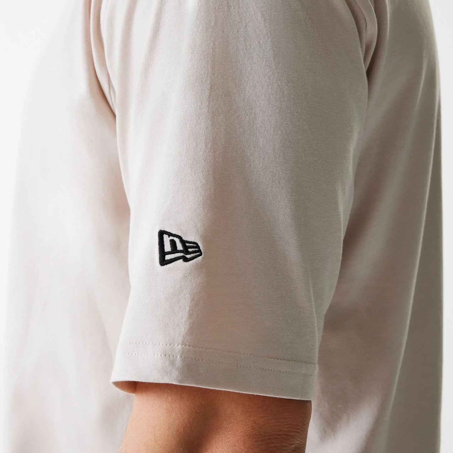 The Male model is wearing New York Yankees MLB League Essential Cream Oversized T-Shirt 5