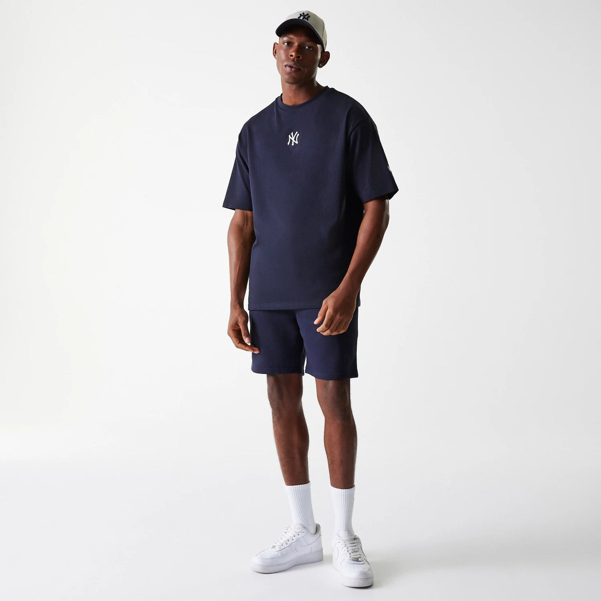 The Male model is wearing New York Yankees MLB League Essential Navy Oversized T-Shirt 7