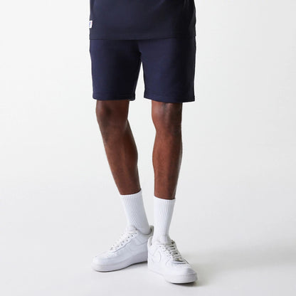 The Male model is wearing New York Yankees MLB League Essential Navy Shorts 3