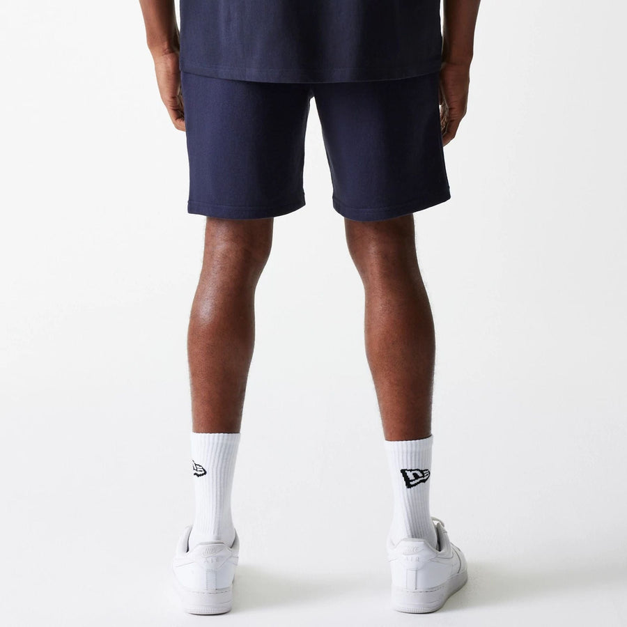 The Male model is wearing New York Yankees MLB League Essential Navy Shorts 2