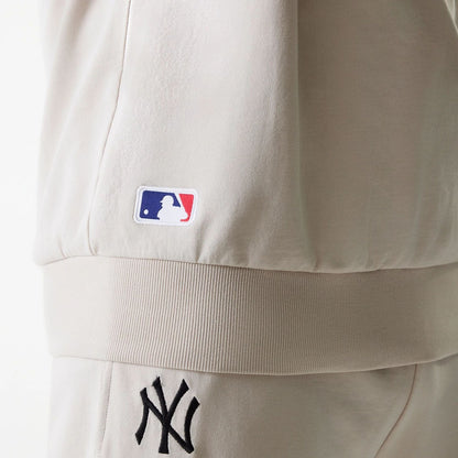 The Male model is wearing New York Yankees MLB League Essential Cream Crew Neck Sweater 6