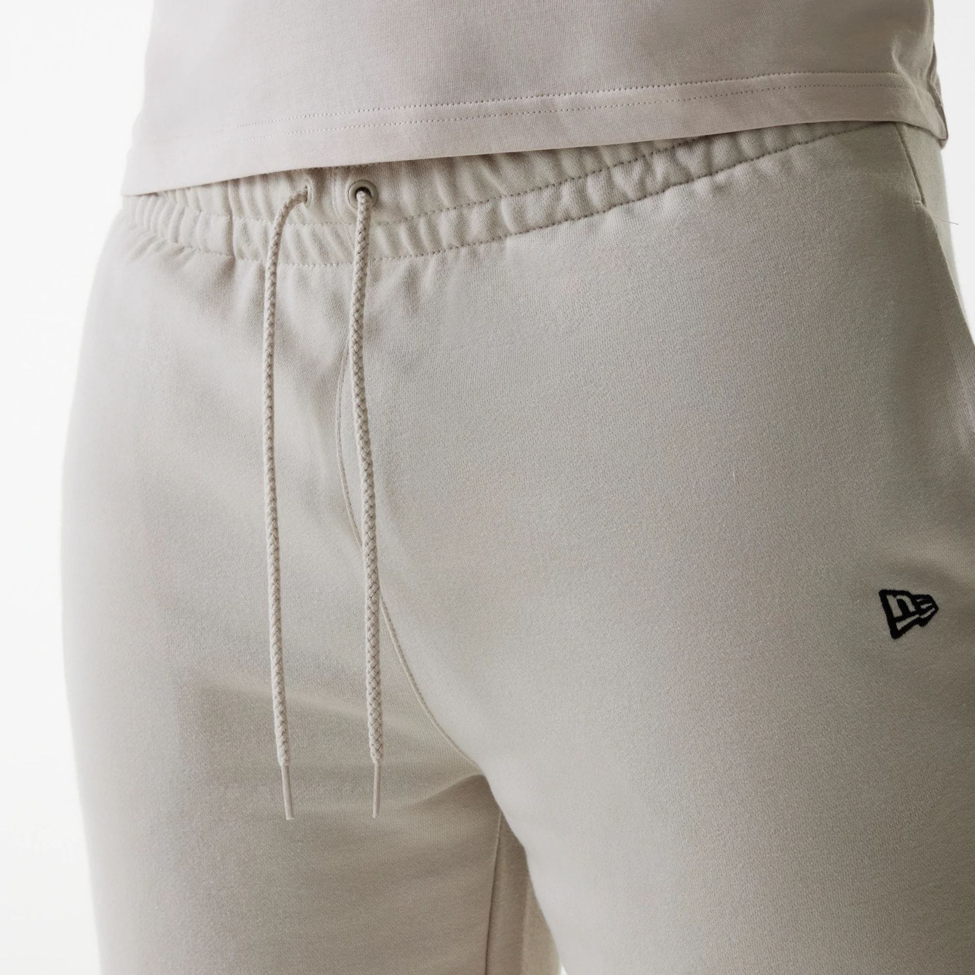 The Male model is wearing New York Yankees MLB League Essential Cream Shorts 3