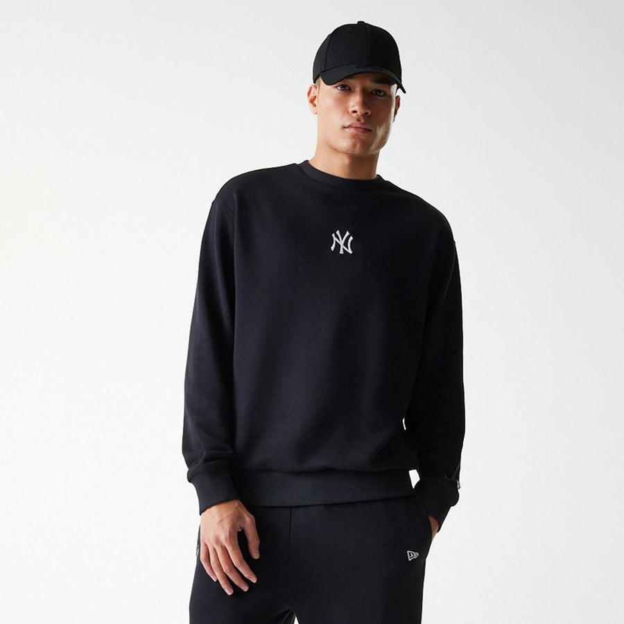 The Male model is wearing New York Yankees MLB League Essential Black Crew Neck Sweater 3