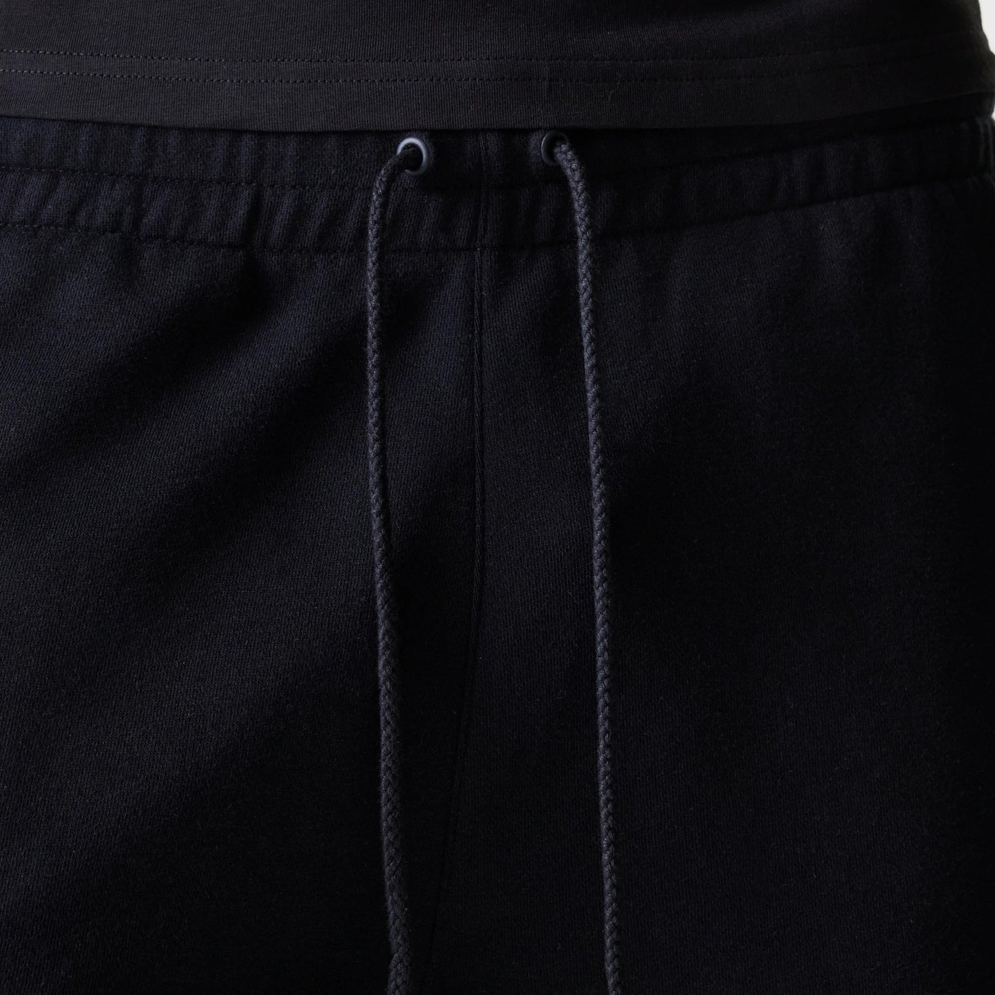 The Male model is wearing New York Yankees MLB League Essential Black Shorts 6