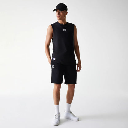 The Male model is wearing New York Yankees MLB League Essential Black Shorts 8