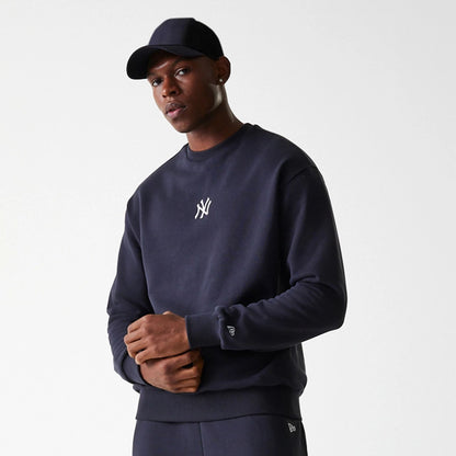 The Male model is wearing New York Yankees MLB League Essential Navy Crew Neck Sweater 3