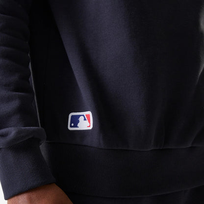 The Male model is wearing New York Yankees MLB League Essential Navy Crew Neck Sweater 6