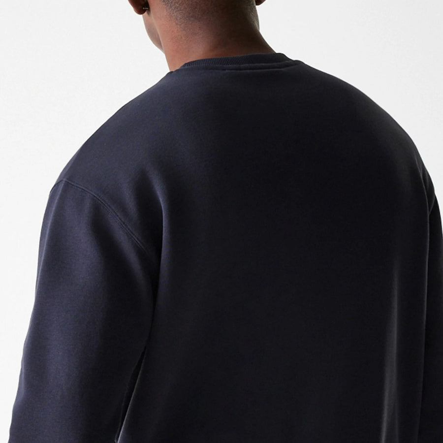The Male model is wearing New York Yankees MLB League Essential Navy Crew Neck Sweater 7