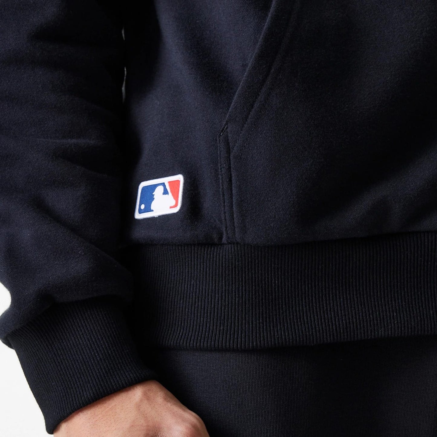 The Male model is wearing New York Yankees MLB League Essential Midi Black Oversized Pullover Hoodie 6