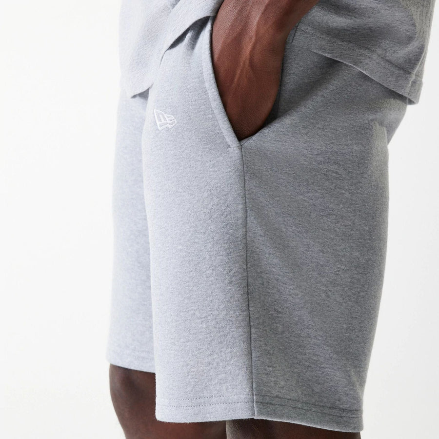 The Male model is wearing New York Yankees MLB League Essential Grey Shorts 5